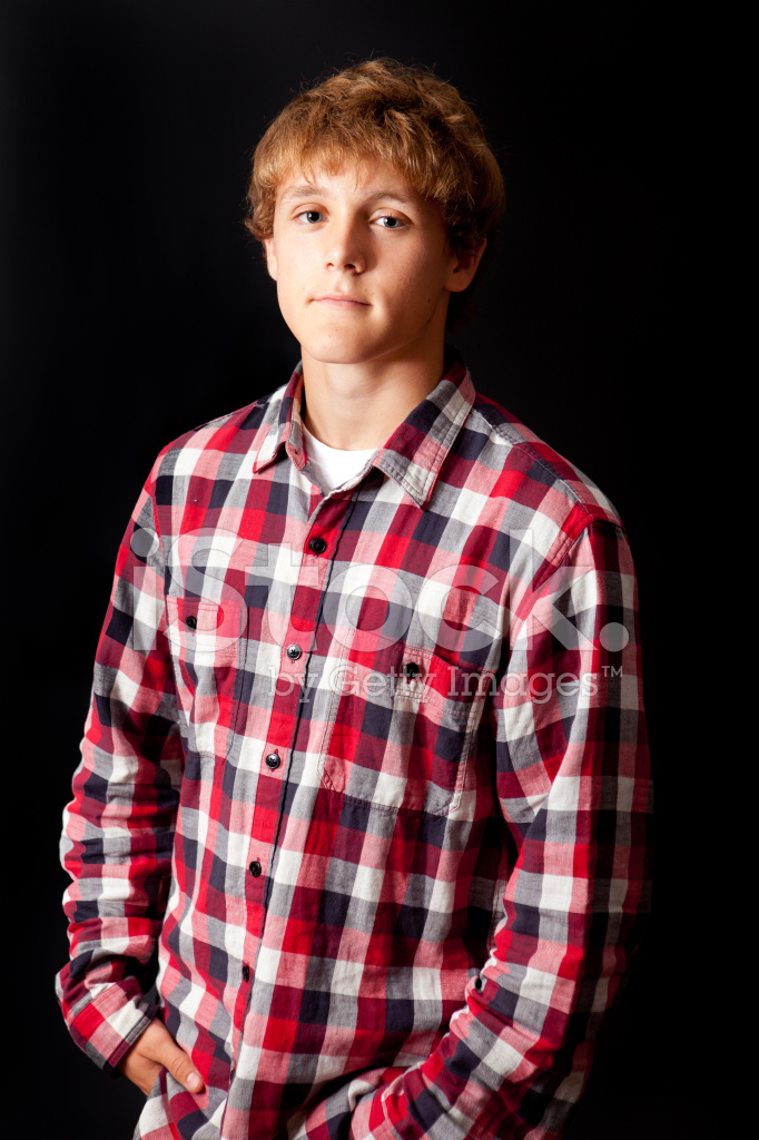 19245791-teenage-boy-in-a-plaid-shirt.jpg