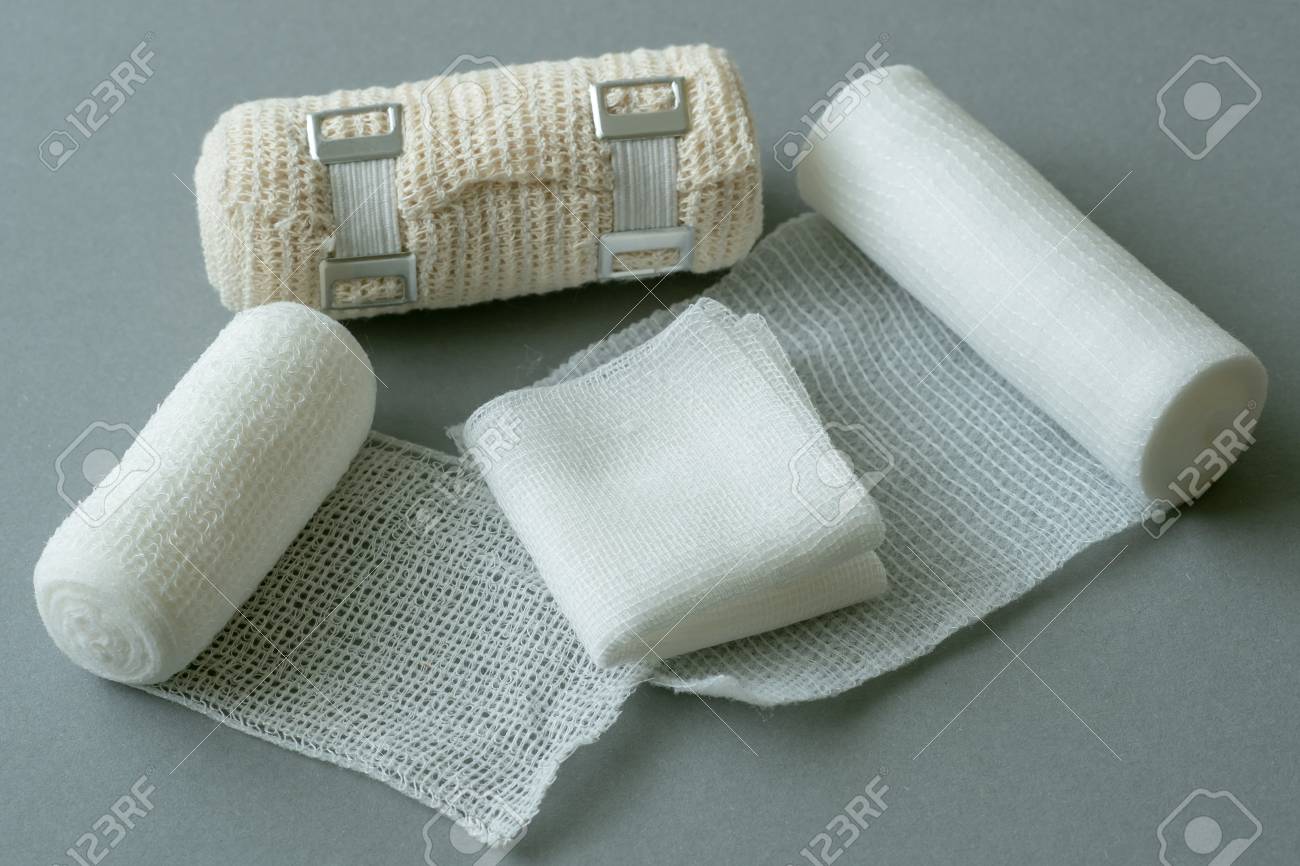 103282281-medical-bandages-on-gray-background-medical-equipment-.jpg